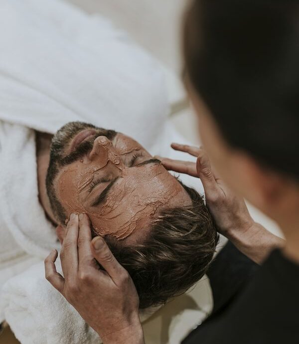 Man having facial massage in spa